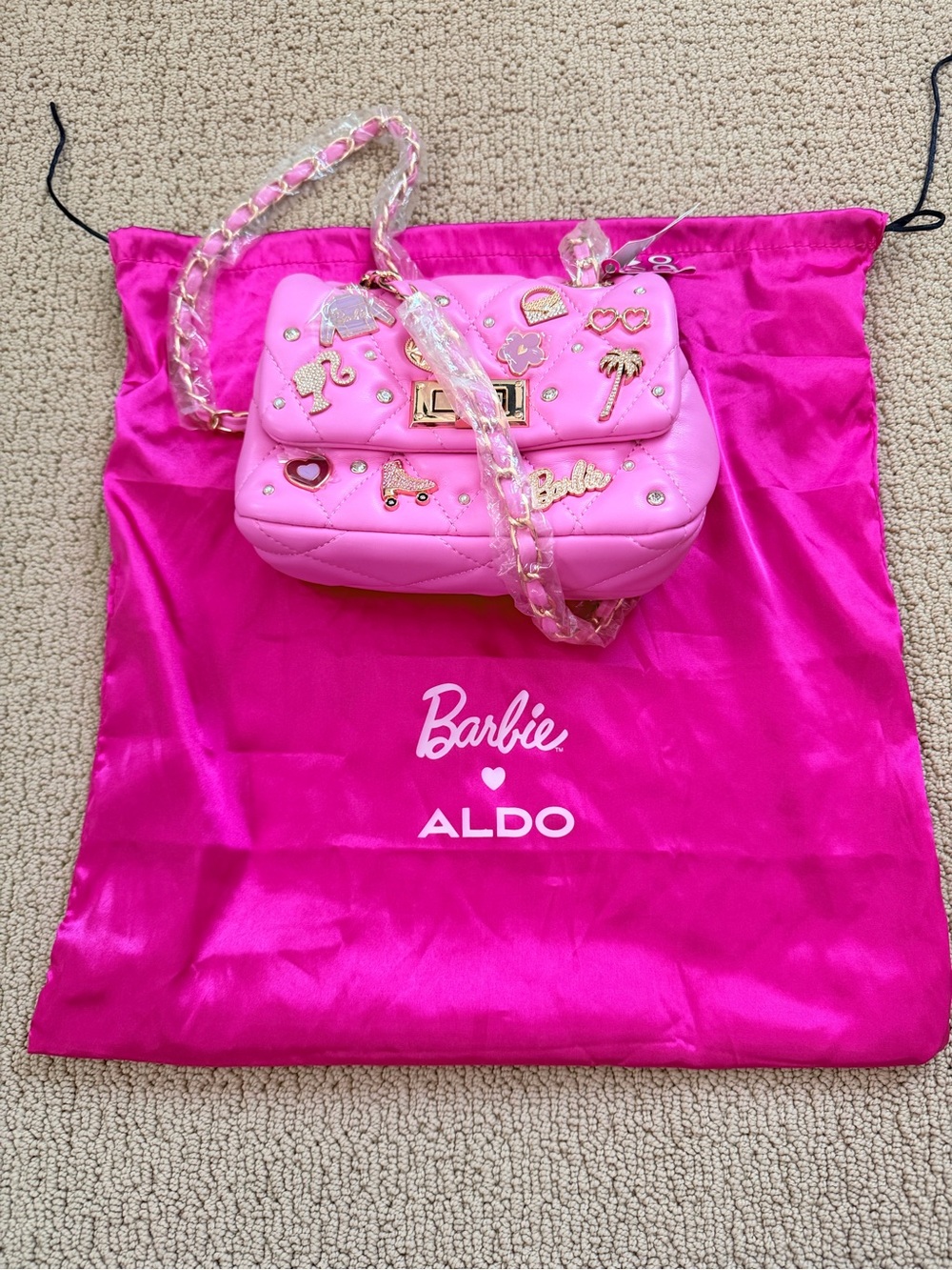 Aldo Pink Quilted Charm Crossbody Bag